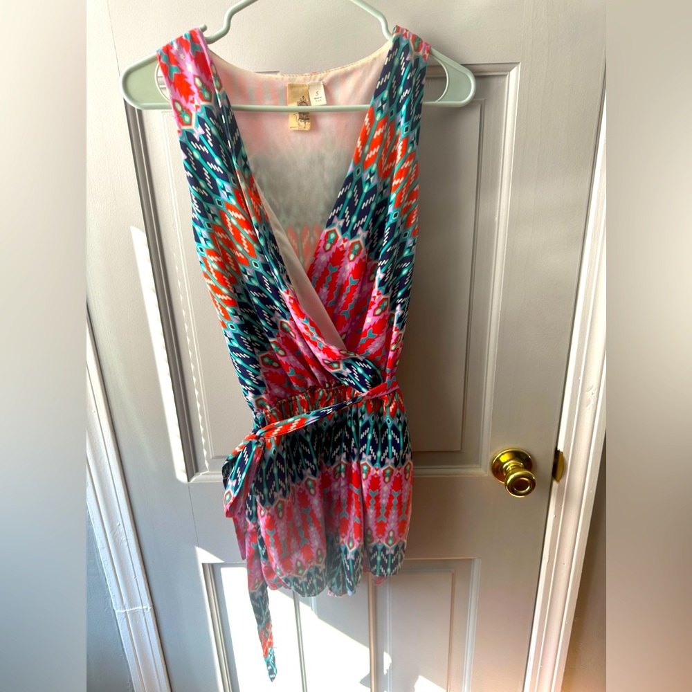 Bright, bold & colorful cozy tie-waist v neck romper with pockets!